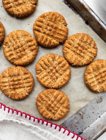several peanut butter cookies on cookie sheet