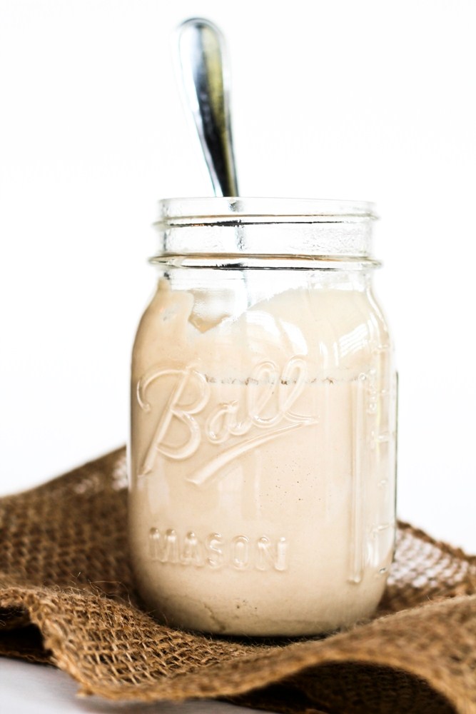 savory sunflower seed butter in glass mason jar