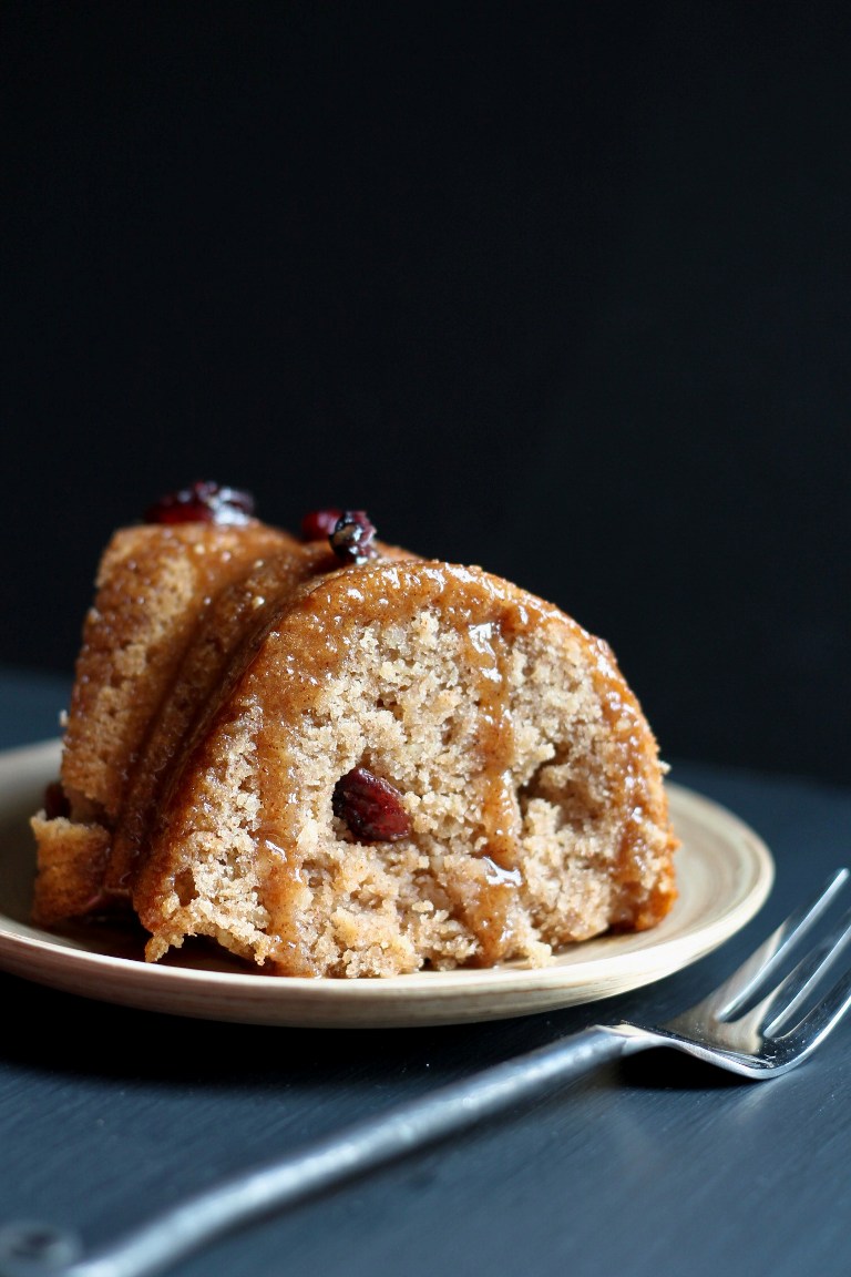 Closeup view of slice of vegan gluten-free cranberry cake