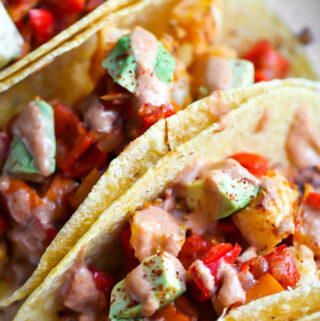 closeup of vegan Mexican potato tacos on platter