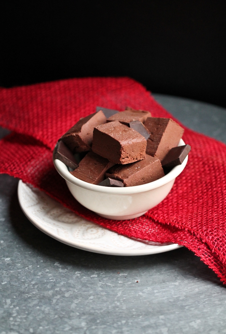 vegan dark chocolate chipotle fudge squares in white bowl