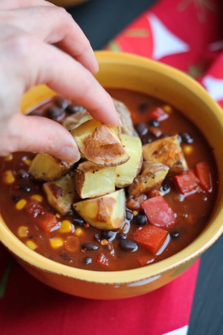 Roasted potatoes on top of vegan cocoa black bean chili
