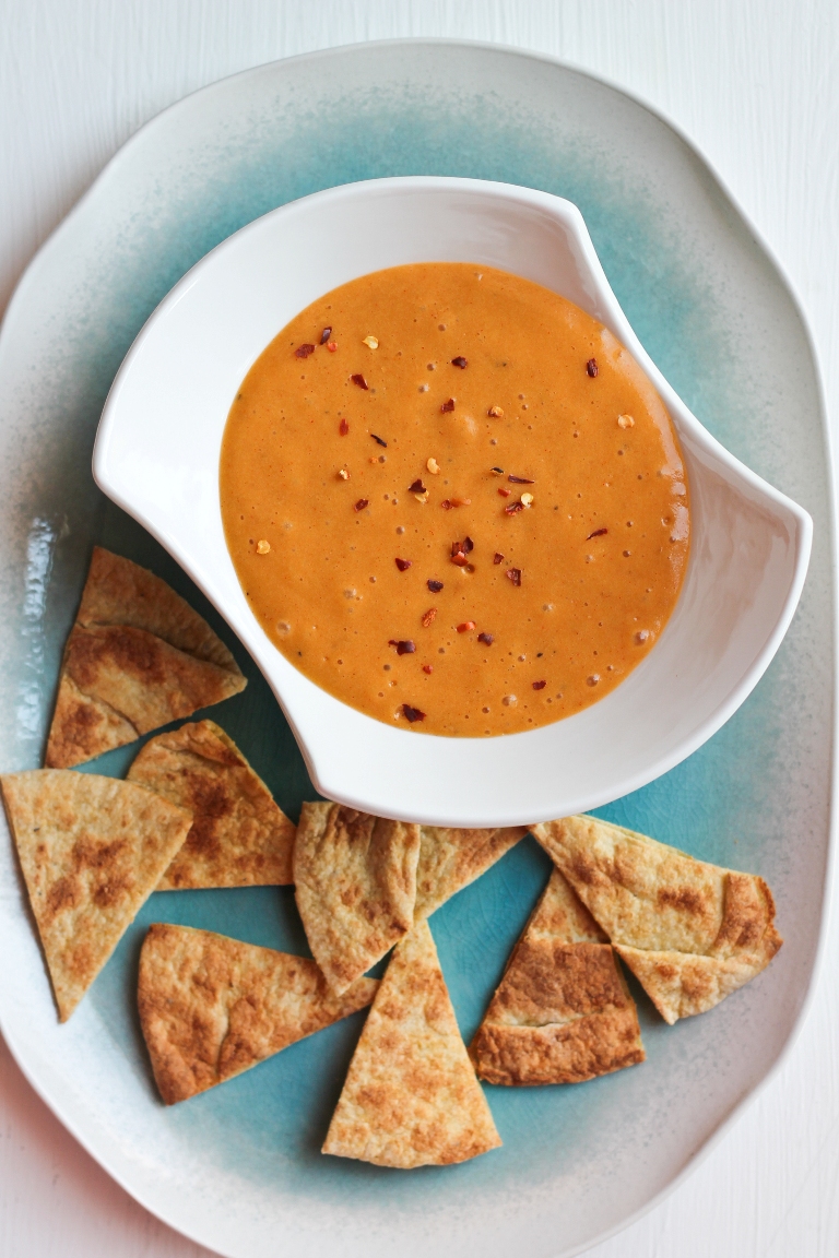 vegan nut free cheese sauce in bowl with chips