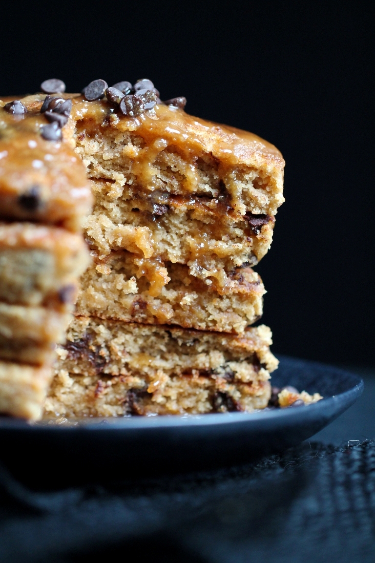Stack of sliced vegan peanut butter chocolate chip pancakes