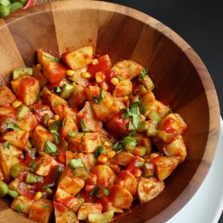 barbecue potato salad in wooden bowl