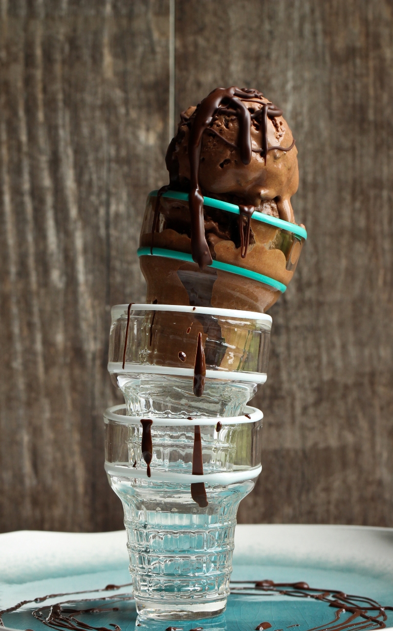 glass ice cream cones stacked on each other with vegan chocolate ice cream