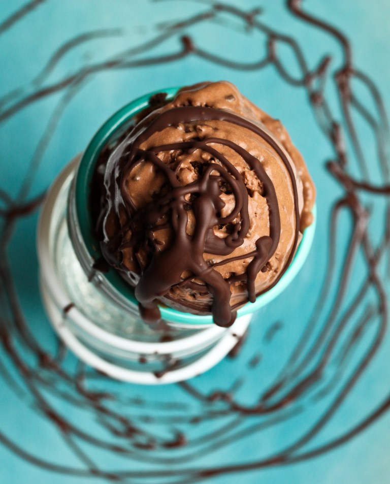 chocolate drizzled on vegan chocolate ice cream overhead