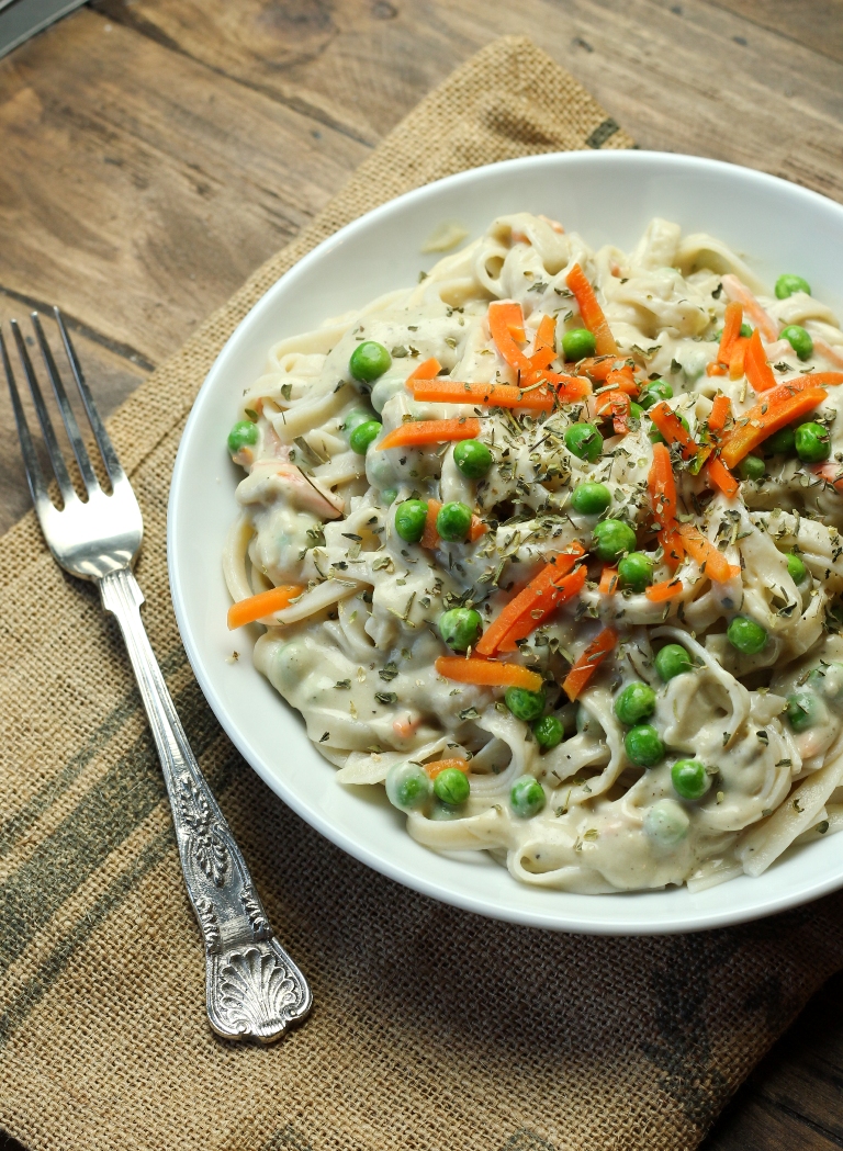 Closeup view of bowl of fettucini past and vegan alfredo sauce 