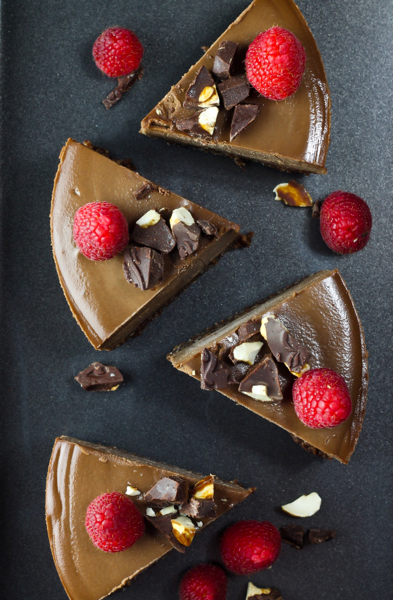 Several cut slices of vegan chocolate cheesecake