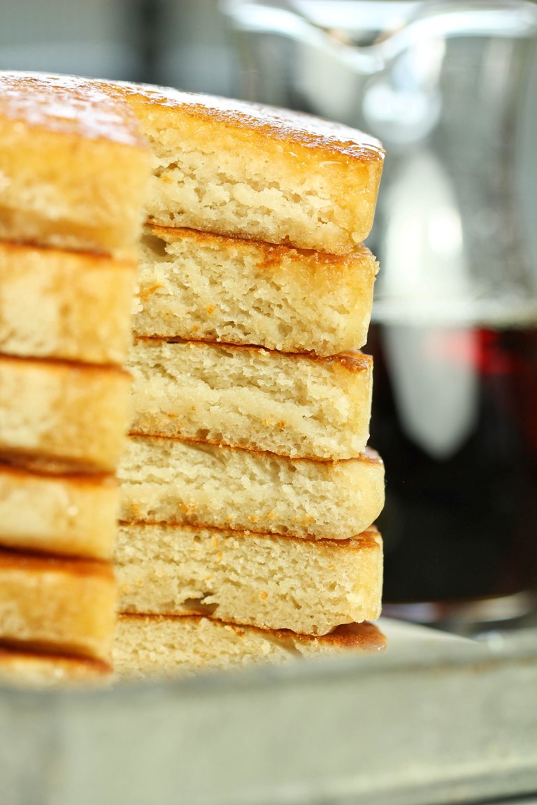 Closeup image of inside of the vegan buttermilk pancakes showing how fluffy.