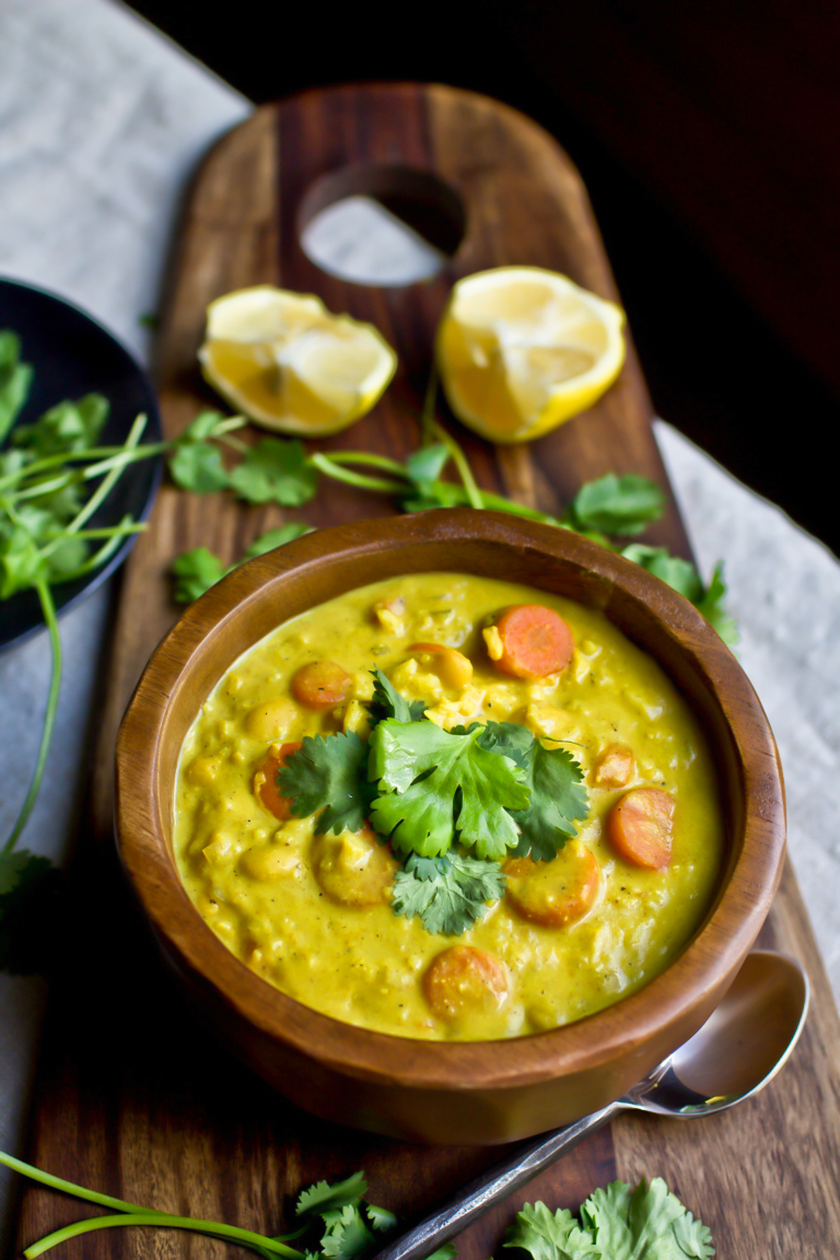 vegan curry rice soup on wooden board