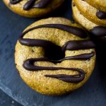 Vegan chocolate chip donut with chocolate drizzle