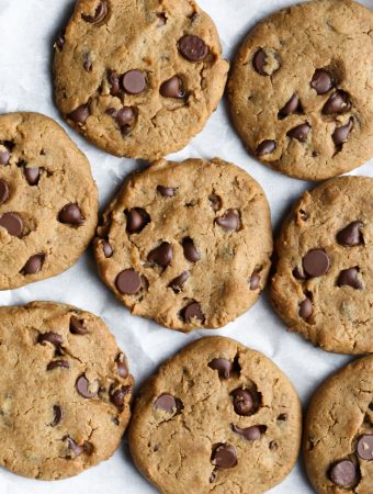 cookies spread out onto parchment paper