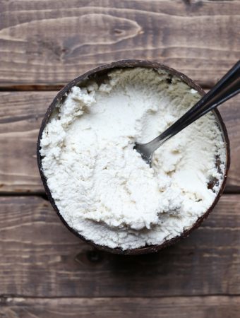 wood bowl of vegan ricotta cheese with spoon