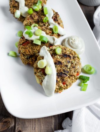 vegan crab cakes with aioli on white platter