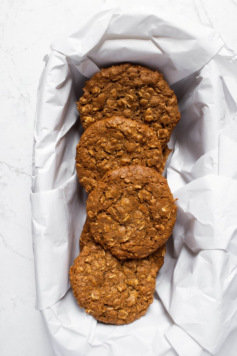 Vegan chai coconut oatmeal cookies lined inside loaf pan