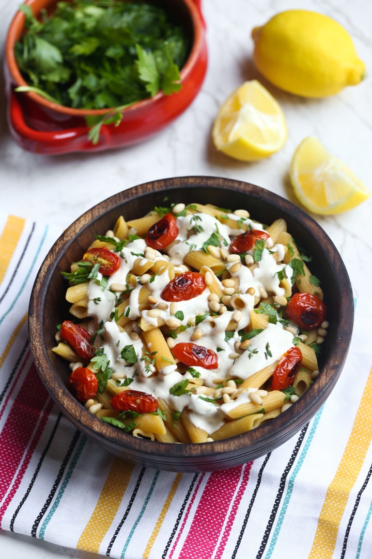 lemon sauce over pasta with roasted cherry tomatoes
