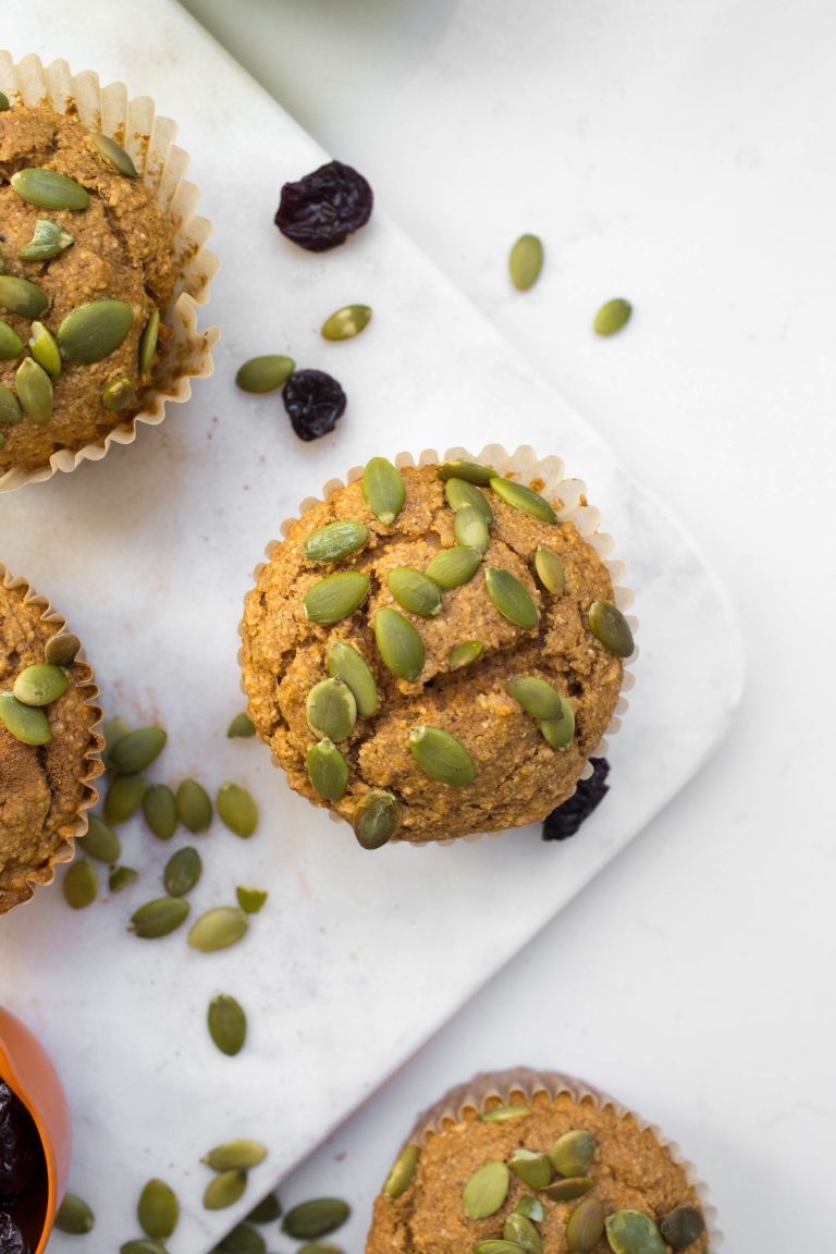 Vegan pumpkin muffin on white marble