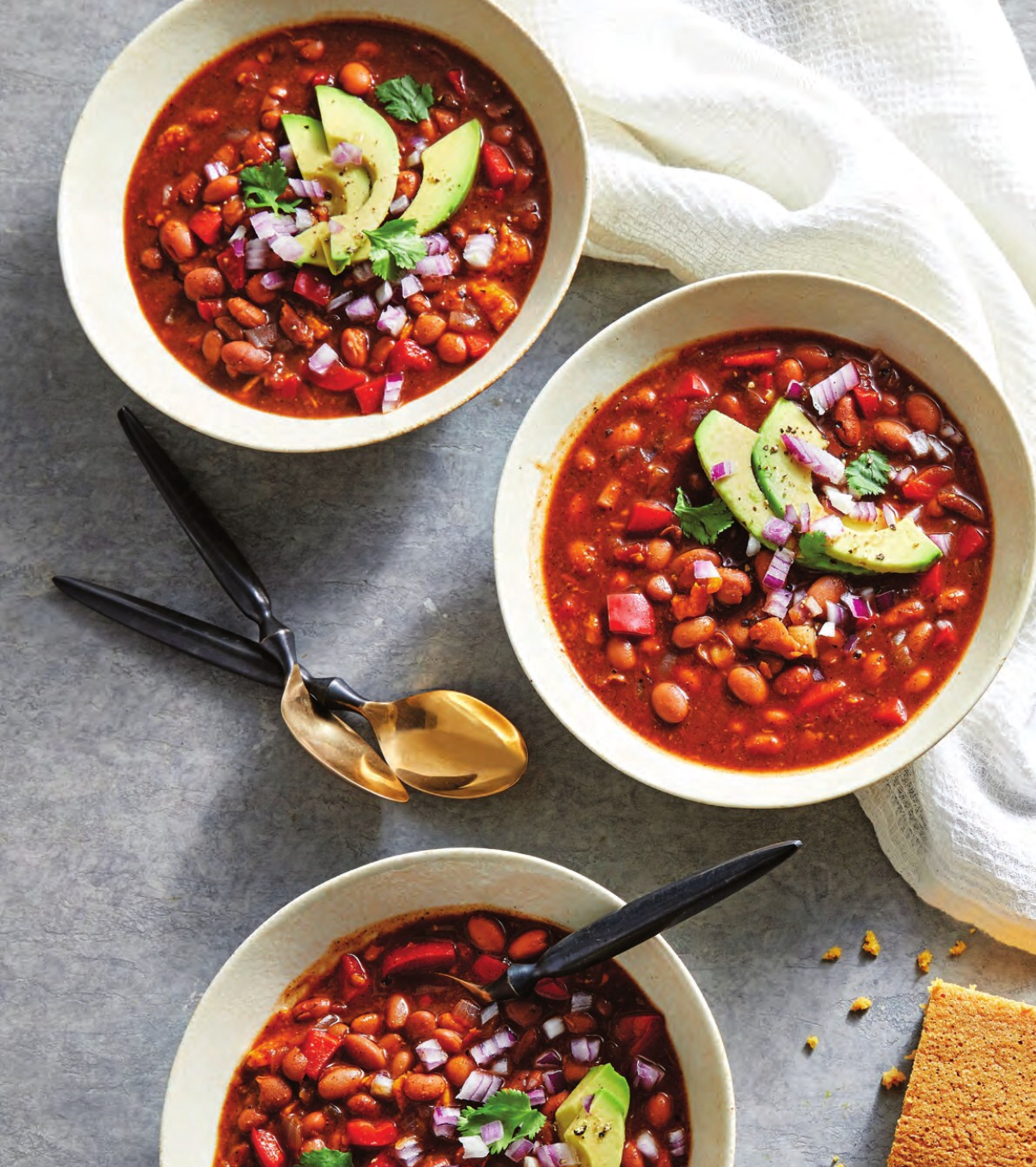 3 bowls of 3 bean chili from the vegan 8 cookbook