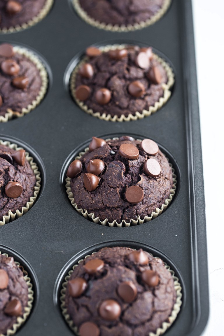 Baked vegan chocolate zucchini muffins in muffin tray