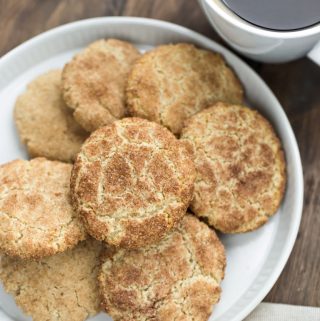 white plate of vegan snickerdoodles and coffee