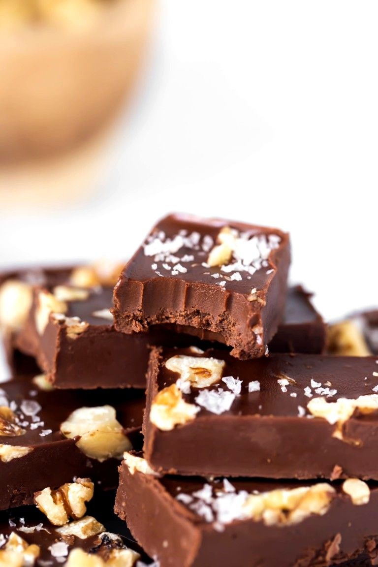 bite of fudge on stack of fudge