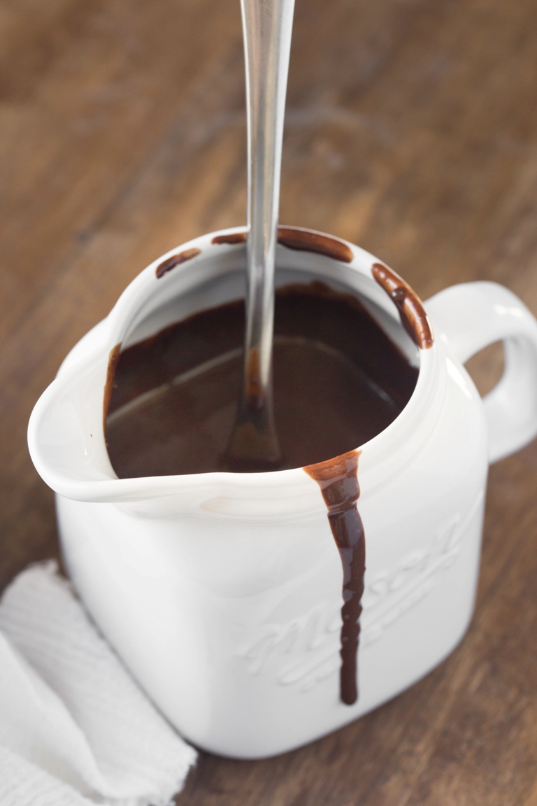 White handle jar holding vegan chocolate sauce