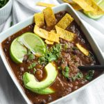 Easy Vegan Black Bean Soup Recipe Oil-free in white bowl