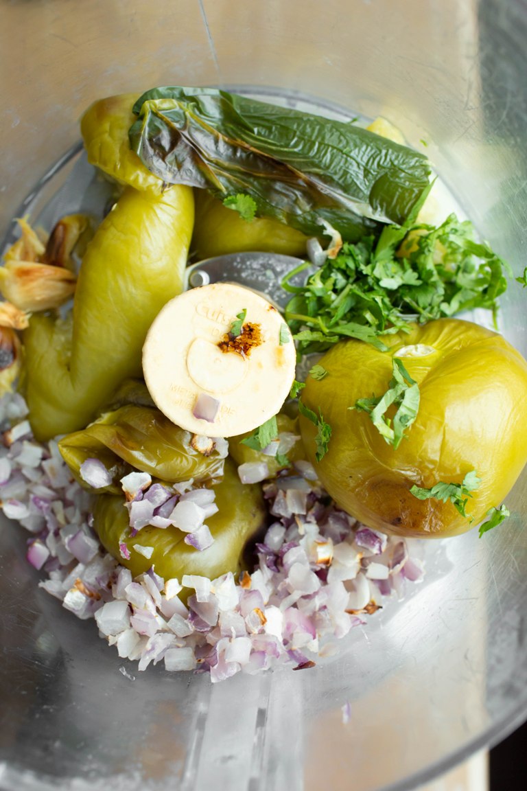 Tomatillo salsa ingredients in food processor