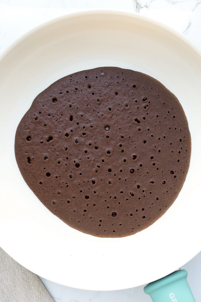vegan chocolate crepe cooking on pan