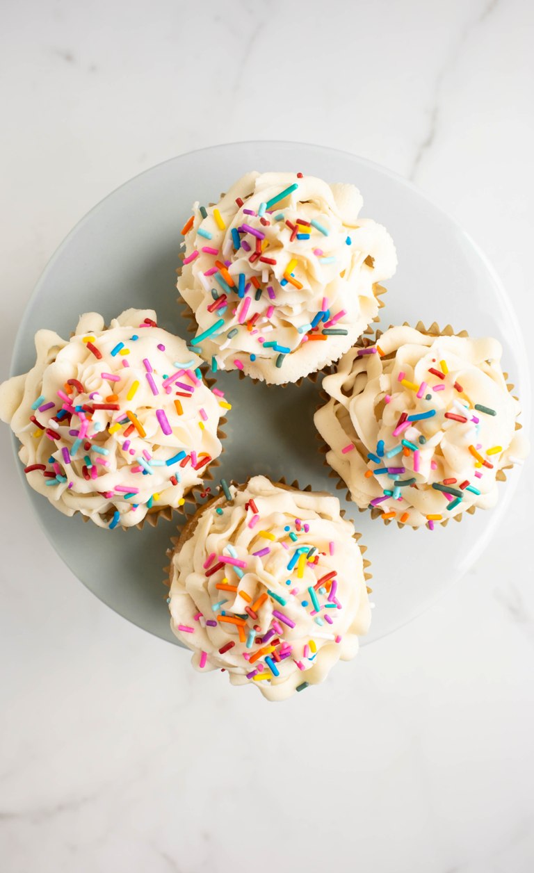 overhead view of vanilla cupcakes