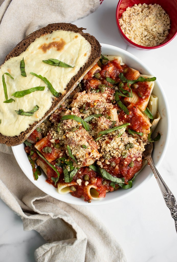 tomato garlic sauce over rigatoni and fresh basil