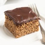 square slice of almond butter cake with fork