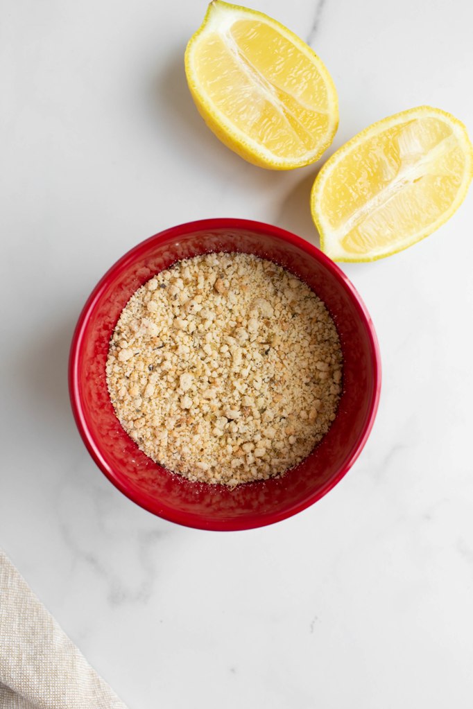 vegan lemon parmesan cheese in red bowl