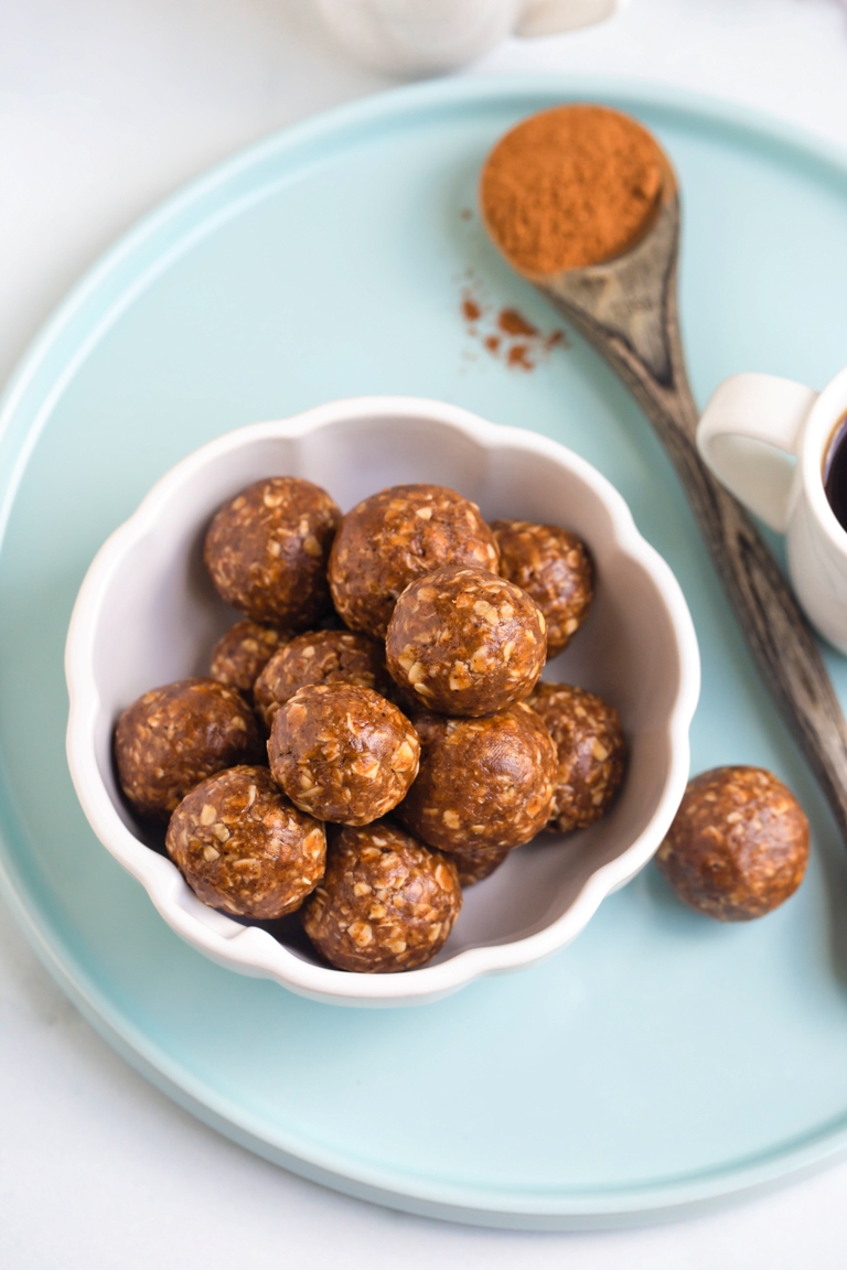 overhead shot of white bowl of chai energy oatmeal balls