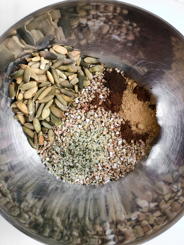 ingredients in silver bowl for buckwheat granola