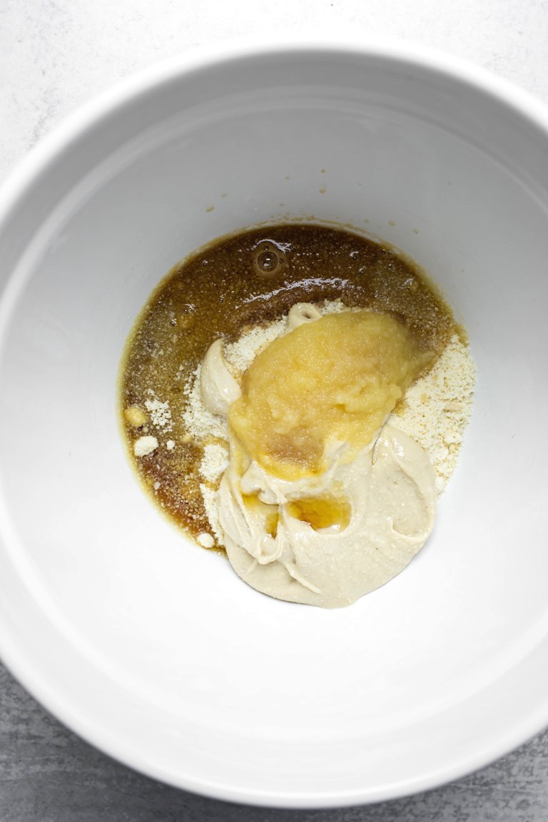 cashew butter cookie ingredients in white bowl