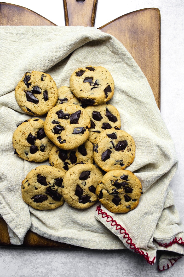 several cashew butter cookies on beige napkin