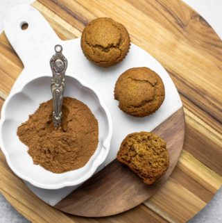 pumpkin muffins next to bowl of pumpkin spices