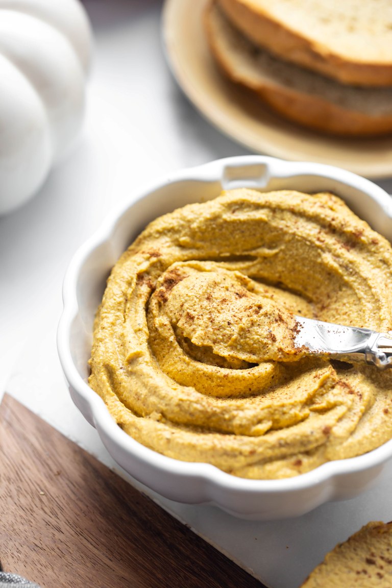 knife sitting in pumpkin cream cheese