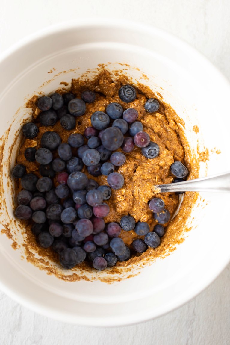 blueberry cake batter in white bowl