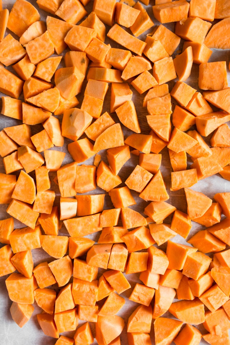 precooked cubed sweet potatoes on pan