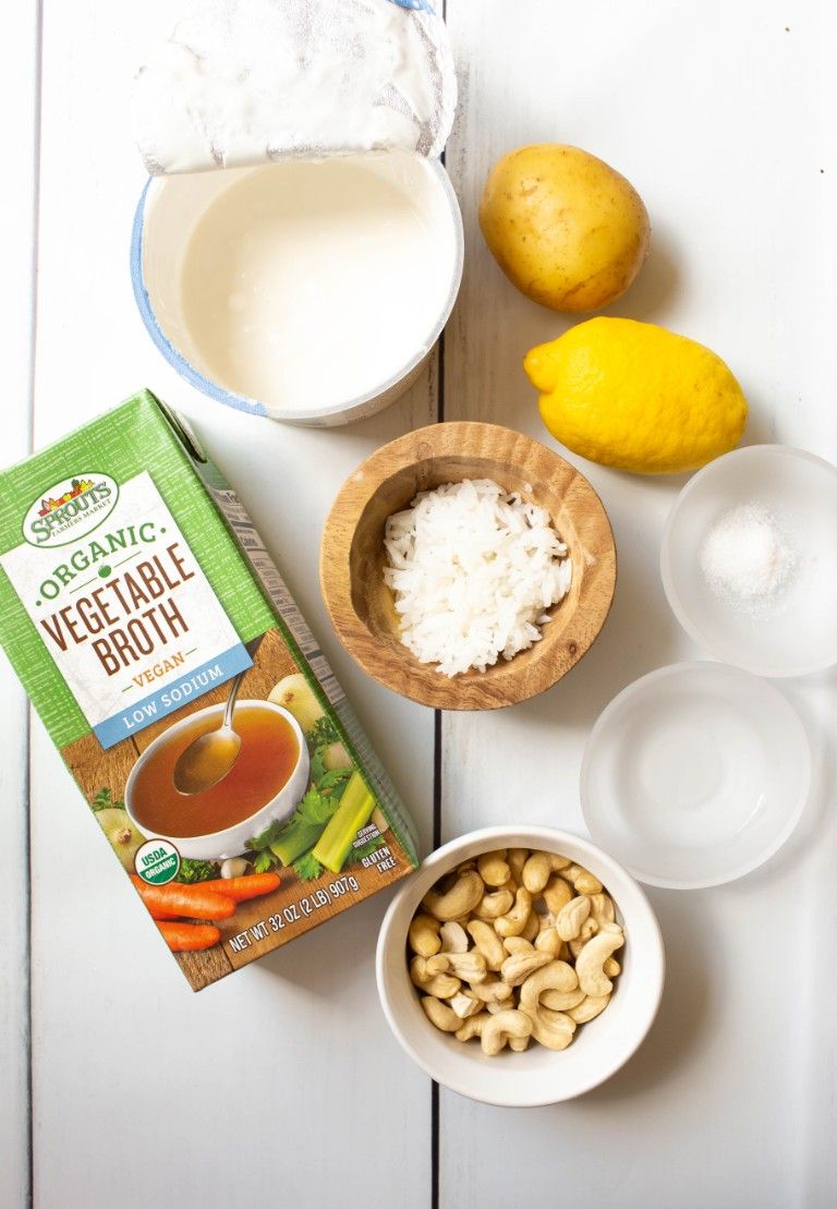 ingredients for vegan mozzarella on white wood table