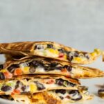 cheesy quesadillas stacked on top of each other
