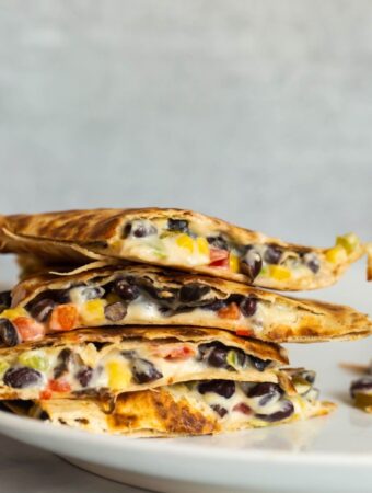 cheesy quesadillas stacked on top of each other