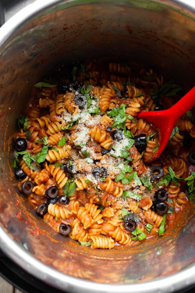 instant pot with pasta olives and fresh basil