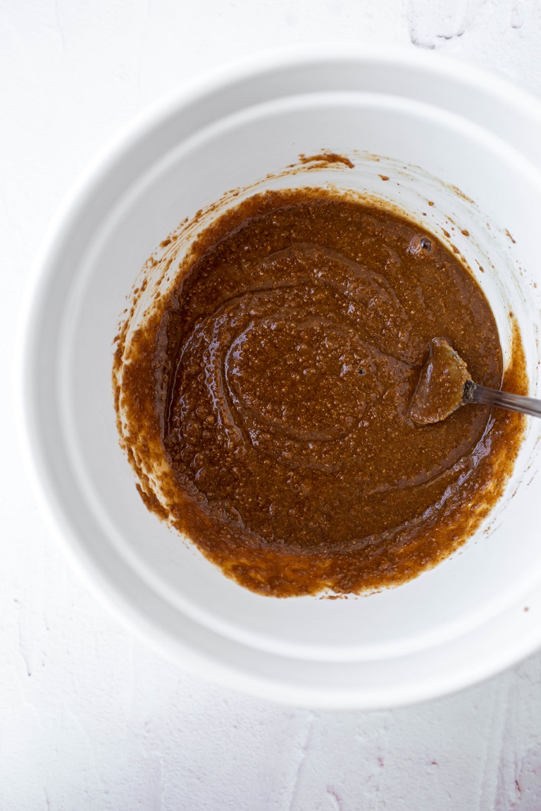 liquids mixed in white bowl