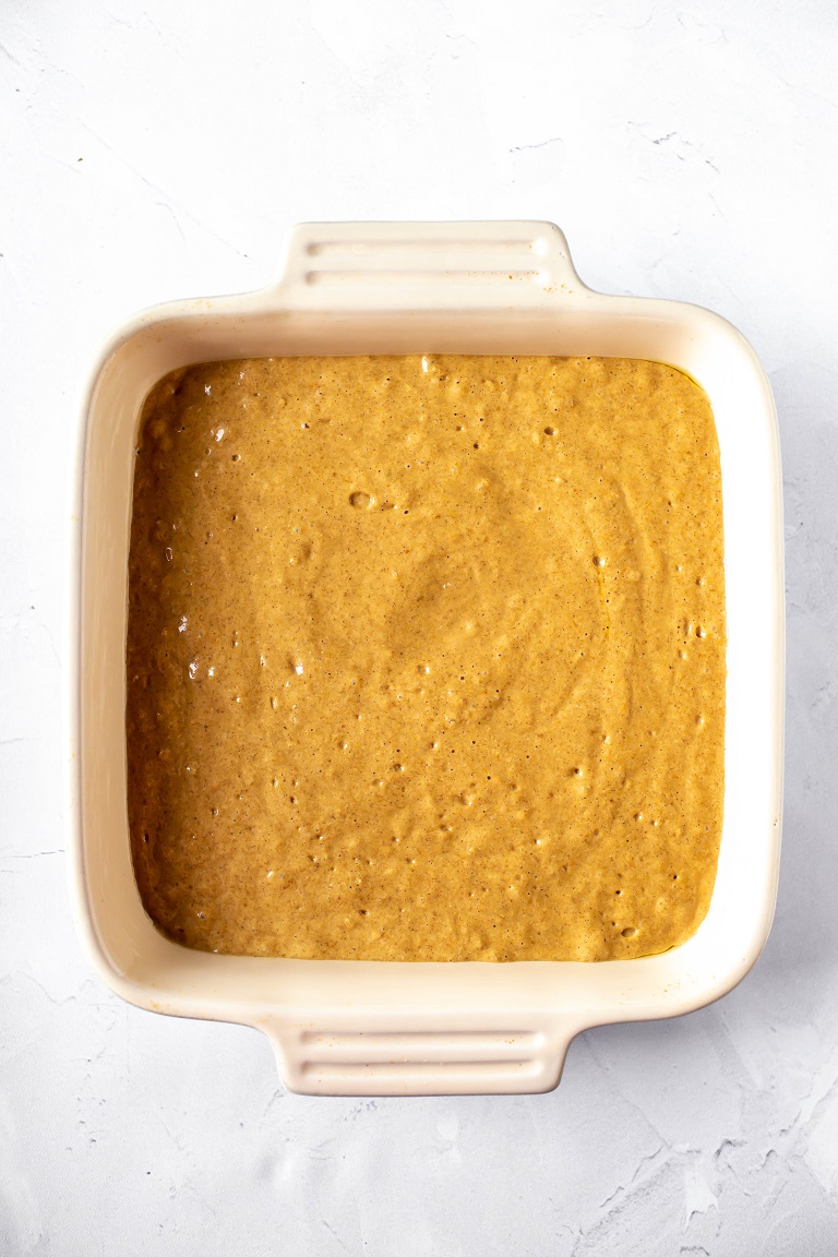 overhead of cake batter in baking dish before baking