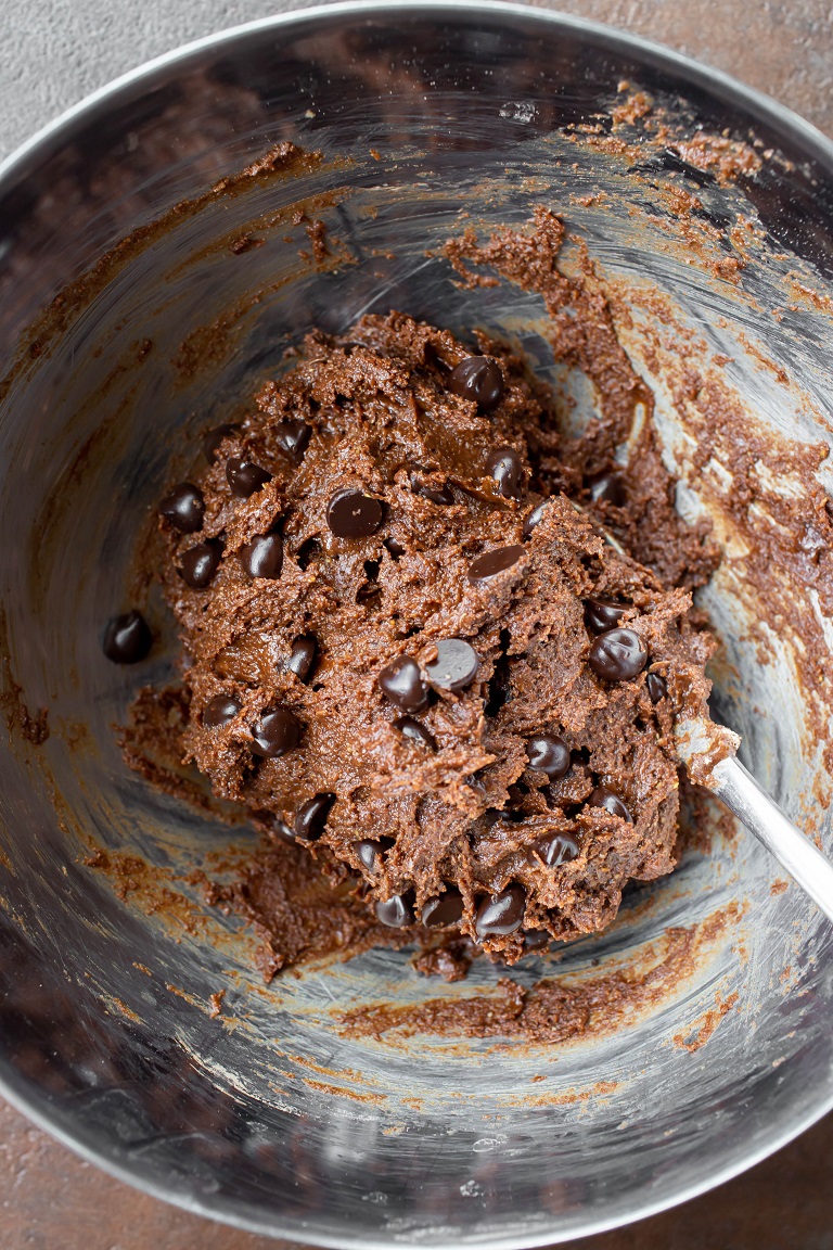 vegan chocolate cookie batter in silver bowl