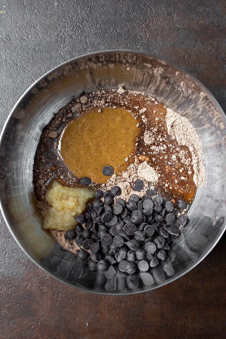 each wet ingredient in silver bowl for the cookies